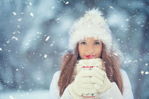 A girl in the winter snow